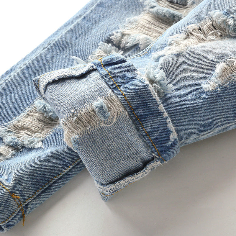 New Children's Ripped Jeans Spring and Autumn